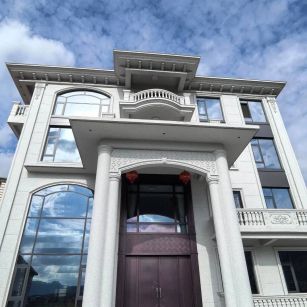 泉州白麻别墅外墙干挂石材效果示例