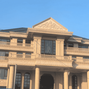 泉州黄金麻别墅外墙干挂石材效果示例